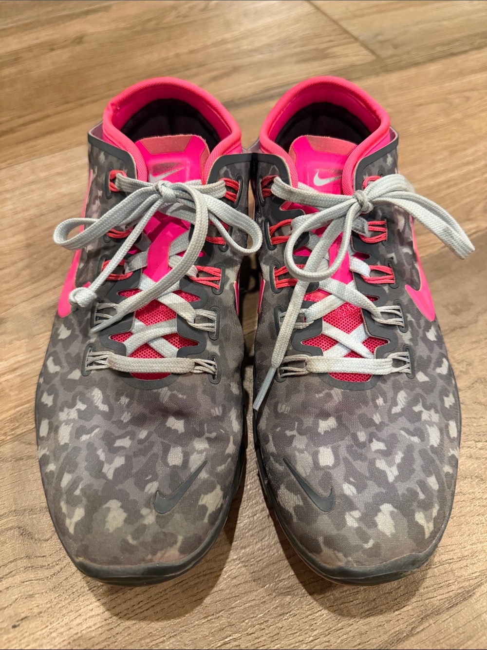 Nike Women’s Gray Camo Running Shoes with Pink Accents